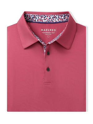 Folded Cranberry Everyday Classic Solid Polo neatly laid out for display