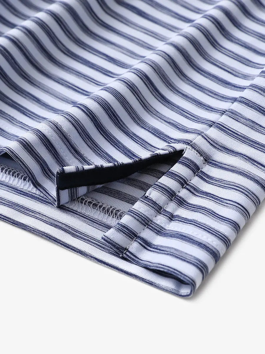 Hem slit detail of DARK BLUE WHITE Unique Watercolour Stripe Polo with soft stripe texture