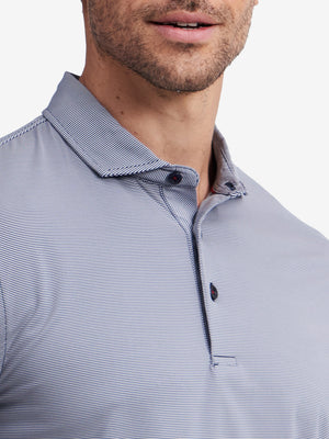 Collar detail of Long sleeve pinstripe jersey polo with clean trim in navy stripe