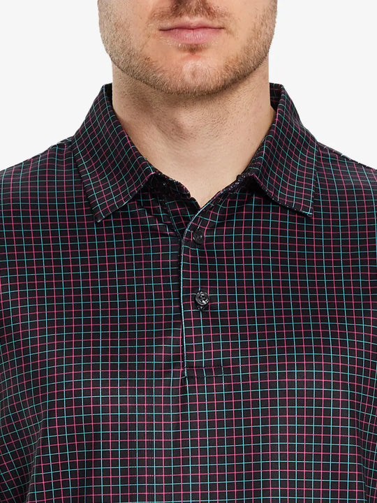 Front half-body view from nose to chest of model wearing BLACK GRID Performance Quick Dry Print Golf Polo.