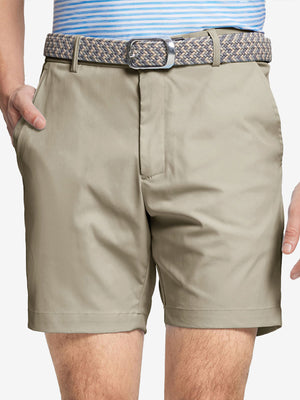 Front waist to knee view of khaki water resistant golf 7 inch shorts, clean athletic fit.
