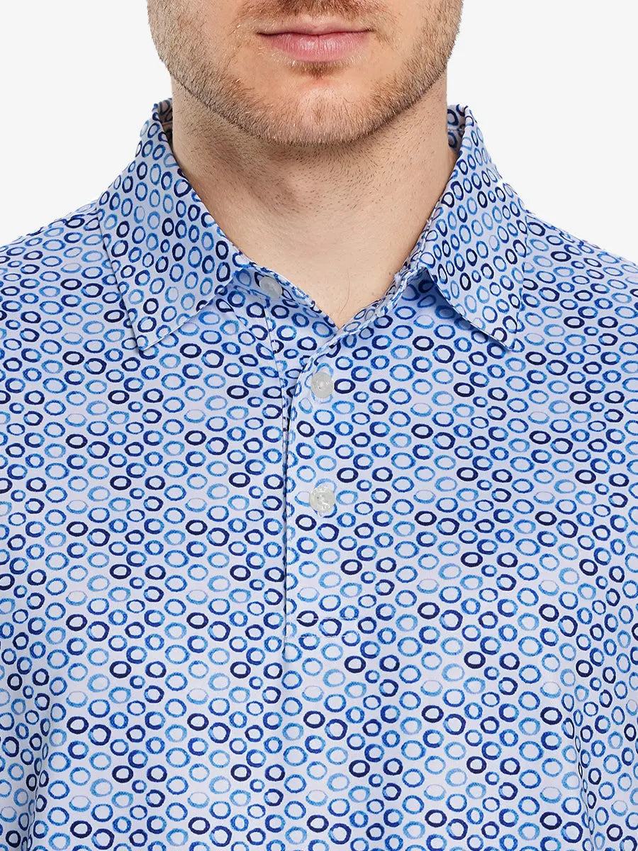 Model wears a WHITE BLUE BUBBLE  golf polo shirt, which emphasizes its cut and comfort when viewed from nose to chest