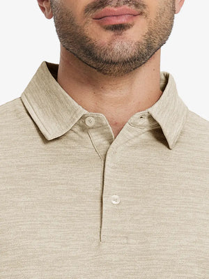 Front half-body view from nose to chest of model wearing LIGHT KHAKI HEATHER Premium Stretch Heather Polo.