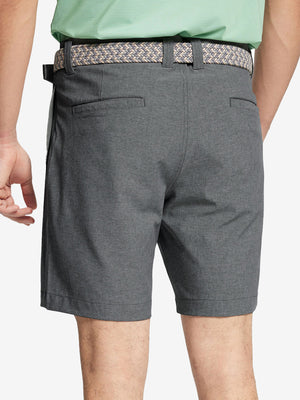 Back view of youth in dark grey Heather Performance Golf Shorts, highlighting rear design and fit