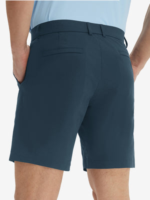 Back lower body view of model wearing the navy stretch soft flat front dress golf shorts, highlighting the rear design