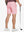 Back lower-body view of model in PINK Water Resistant Versatile 8 Pockets Shorts.