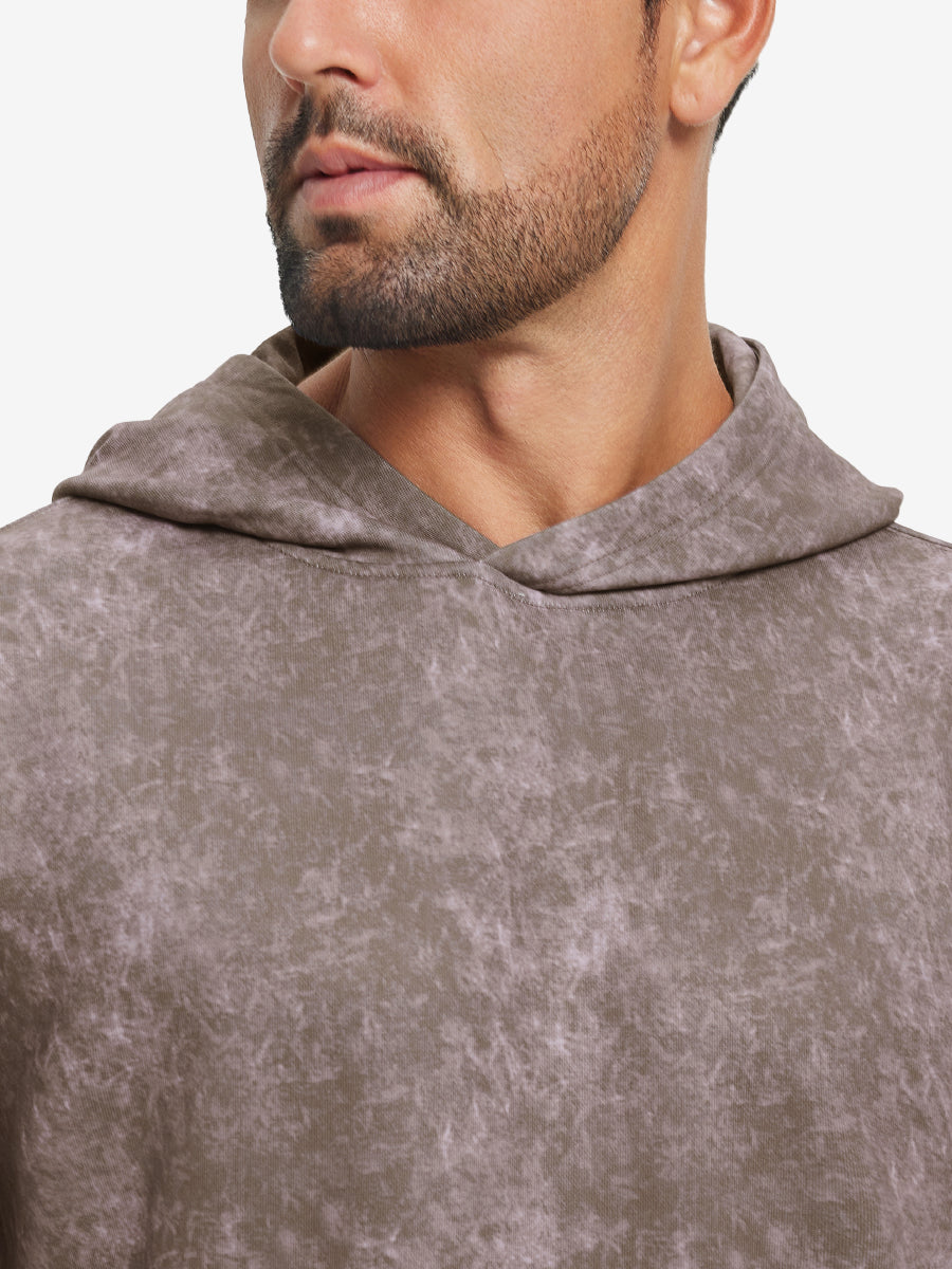 Close-up of neckline and drawstring area of the exclusive print kangaroo hoodies in grey brown.