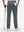 Back lower body shot of model wearing dark gray breathable casual slacks with 4 pockets