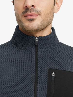 Close-up from nose to chest, showing collar detail of midweight warm stretchy quarter zip pullover in navy.