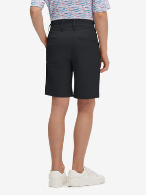 Back lower body in black boys lightweight dry fit flat front golf shorts