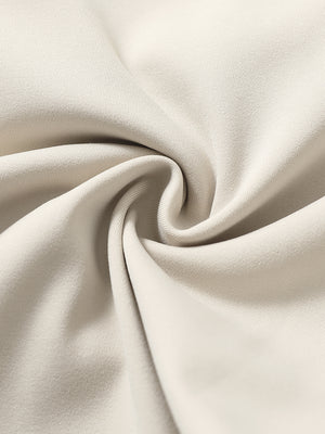 Fabric close-up showing the fleece stretch material of light khaki fleece stretch water resistant boys joggers.