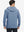Back upper body view of the colony blue melange classic heather hoodie, model turns head slightly with ease.