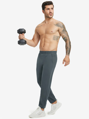 Full body front view of model wearing Water Resistant Comfy Fleece Golf Joggers in dark grey