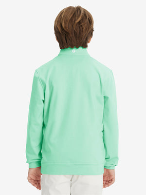 Back upper body of model wearing youth winter micro-fleece quarter zip pullover in turquoise