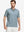 Front half-body of model in blue abstract stretch printed collarless henley golf shirts