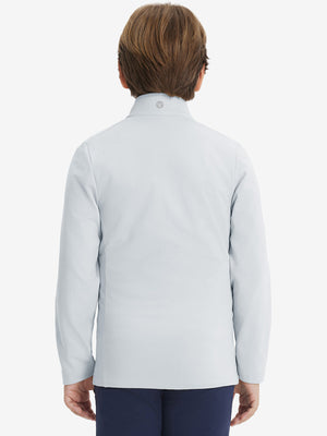 Model in kids soft lightweight fleece lined jacket in misty grey, showing back half-body view.