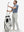 Front full body shot of model wearing silver gray flat front golf joggers pants with belt loops
