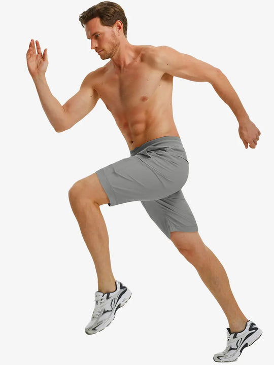 NEUTRAL GREY 7 Inch Performance Active Shorts running action full view