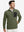 Model with one hand in side pocket, wearing midweight warm stretchy quarter zip pullover in green.