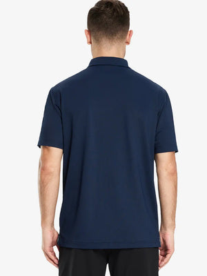 Back view half-body of model in NAVY Ventilated Pique Performance Polo