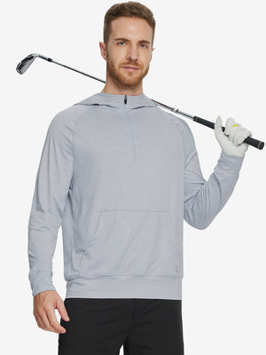 Male model holding a golf club, wearing the Quarter Zip Hoodie with Kangaroo Pocket in Faded Denim Heather.