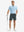 Full-body front view of model wearing the iron grey stretch soft flat front dress golf shorts for a complete look