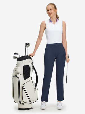 Full-body front view of model wearing the navy women's lightweight high waisted golf pants for a complete look