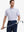 Model wearing Pinkish Purple Cobalt Stripe Performance Stripe Golf Shirt – front half-body pose