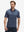 Front half-body shot of model wearing the navy sailboat 4 way stretch print collared polo shirt for a casual sporty look