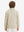 Back upper body of model wearing youth winter micro-fleece quarter zip pullover in light khaki