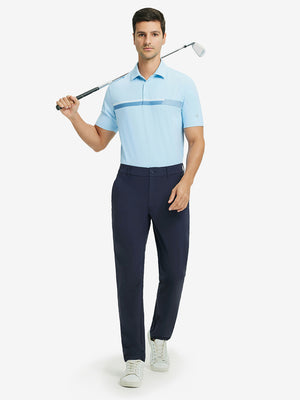 Full-body shot of model holding golf club, styled with quick dry casual dress pants in navy.