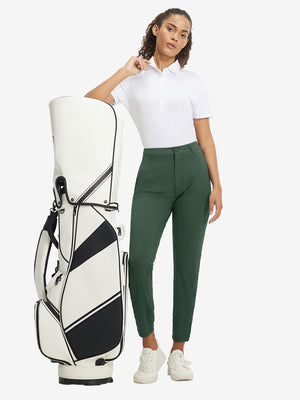 Woman wearing Women's Ultra-stretch Quick Dry Sweatpants with Ankle Zips in forest green, full body front view