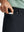 BLACK 4-way Stretch Performance Solid Shorts, front pocket holding golf ball detail, 7 Inch