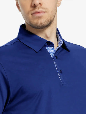 Male model wearing the Klein Blue Everyday Classic Solid Polo, front view from nose to chest