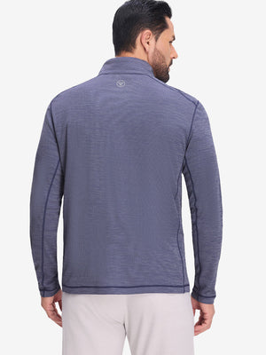 Back upper body shot of model wearing light dark blue grid featherweight midlayer quarter zip pullover