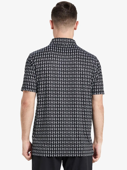 Back half-body view of model in BLACK WHITE TWISTER Performance Quick Dry Print Golf Polo.
