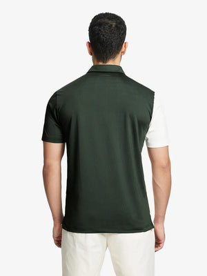 Back half-body view of model in OLIVE GREEN Moisture Wicking Color Block Polo Shirt.