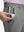 Detail view of front pocket on gray blue breathable casual slacks with 4 pockets