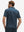 Back half-body view of model wearing the american flag eagle 4 way stretch print collared polo shirt, highlighting the rear silhouette