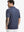 Back half-body view of model in SPACE DYE STRIPE Performance Yarn Dye Striped Polo
