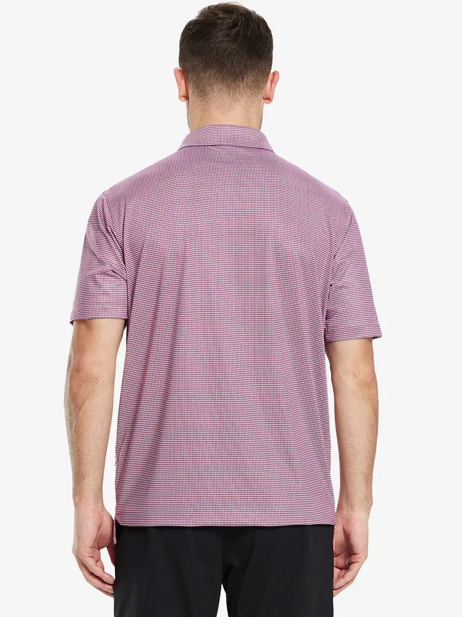 From the back, the model shows the back design of the RED PUZZLE BLOCK Polo shirt, clearly showing the shape and cut of the garment