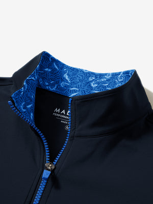 Collar zipper and inner neck pattern detail of the lightweight golf quarter zip pullover in navy.