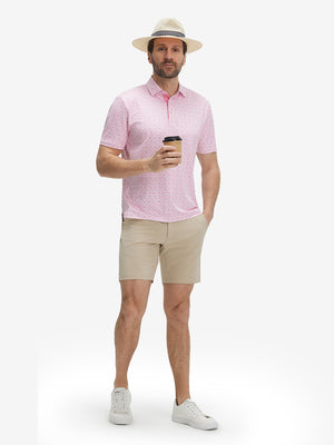 Full-body front view of model wearing the pink wine glass 4 way stretch print collared polo shirt, showing the complete outfit