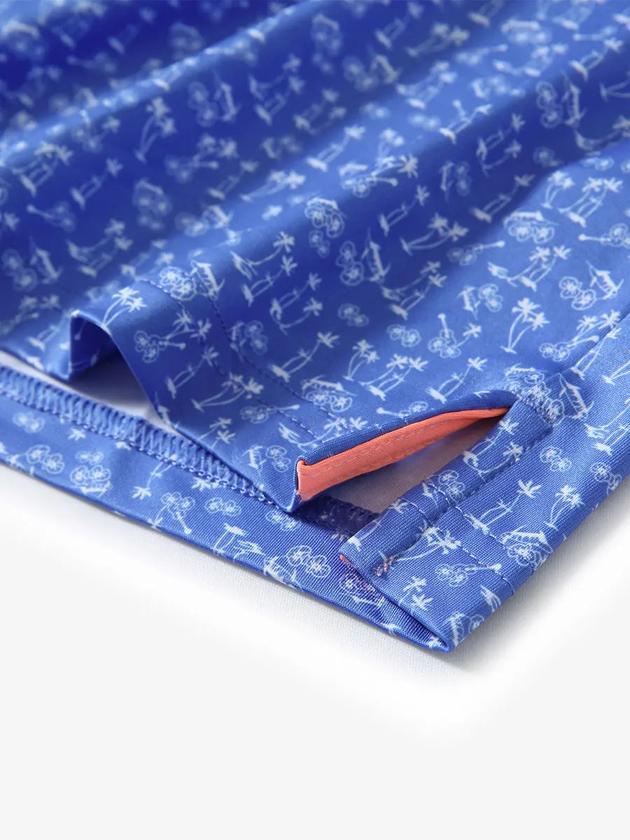 Showcasing the corner openings of the Ocean Blue Palm Pattern model polo shirt, the fresh and natural design complements the athletic features.