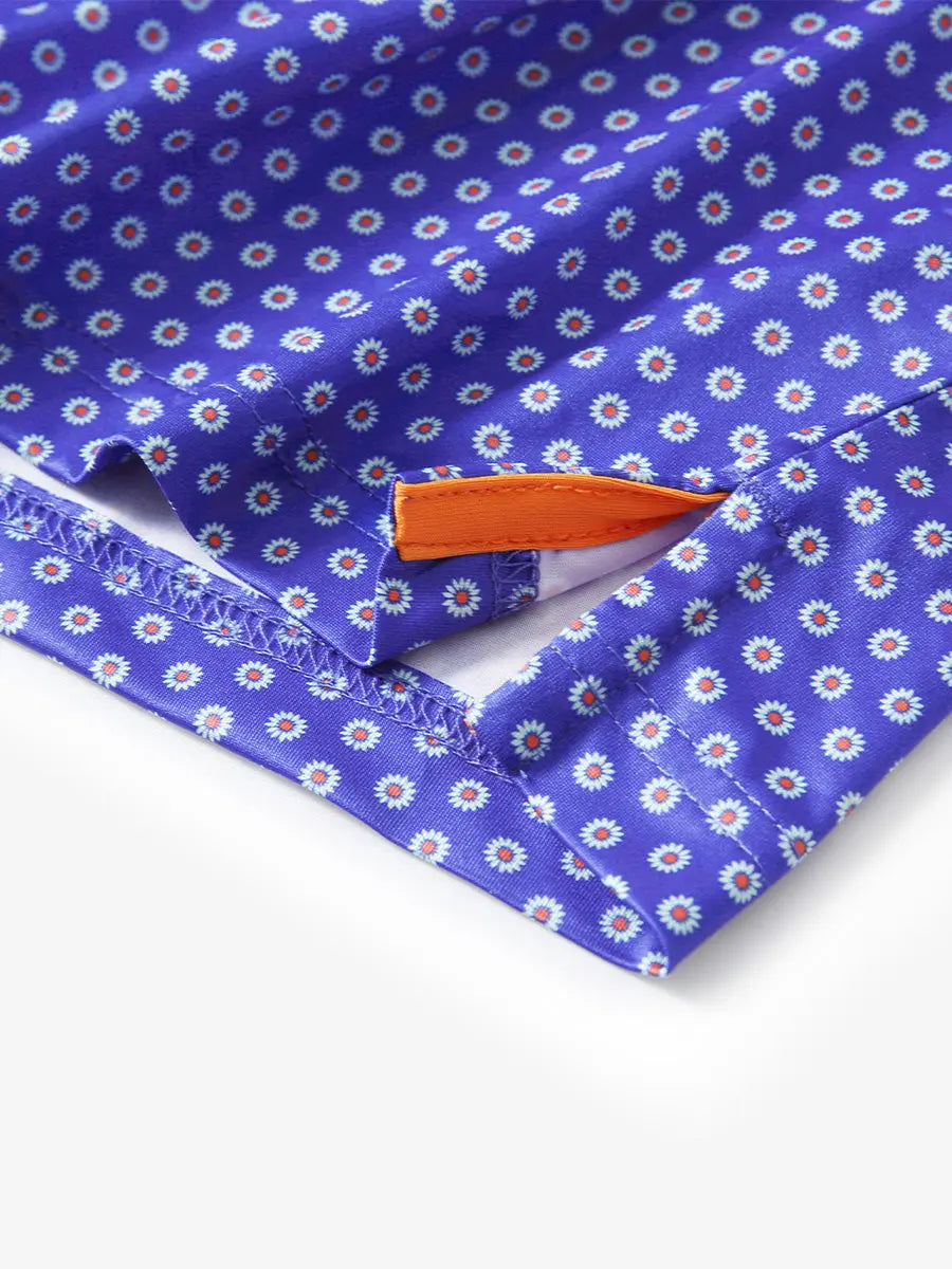 Hem slit detail of BLUE DAISY Performance Quick Dry Print Golf Polo highlighting stitching and finish