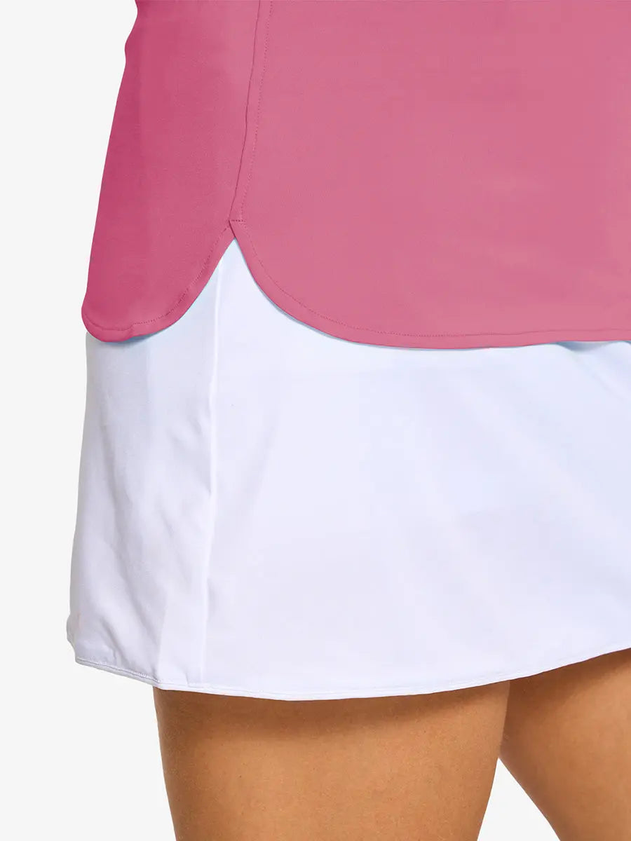 Detail shot of side hem opening on PINK LEMONADE Women's Performance Solid Polo