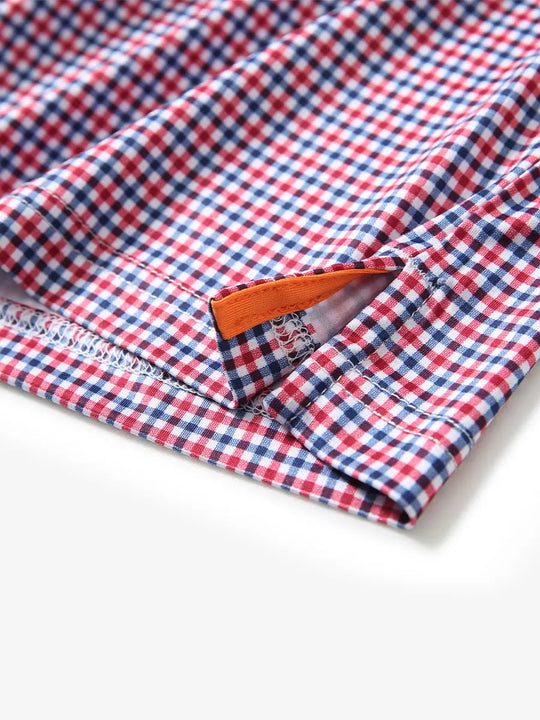 MAELREG's hem slit detail showcases the RED BLUE GINGHAM Polo shirt. Its refined craftsmanship and fabric texture highlight its high quality