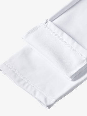 Boys Stretch Fleece Lined Casual Golf Pants in white, flat lay showing fleece lining