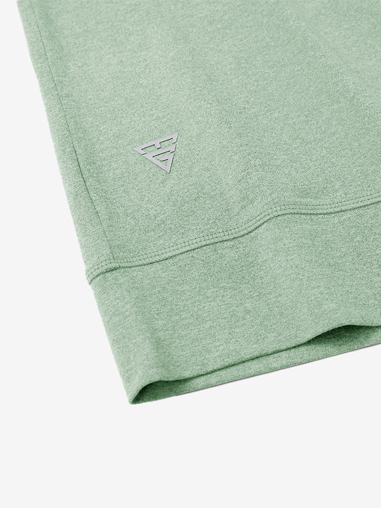 Hem detail of quarter zip melange pullover beryl green melange with small maelreg logo.