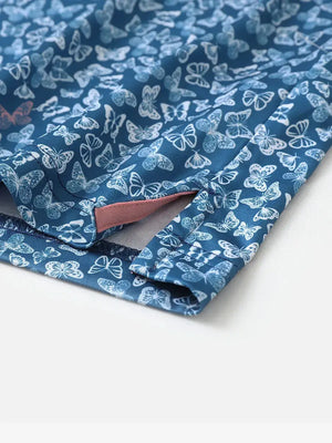 Hem slit detail of MAELREG Performance Jersey Print Polo in Blue White Butterfly – comfort & movement